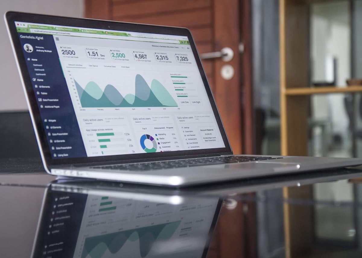 A laptop comparing ecommerce platform options